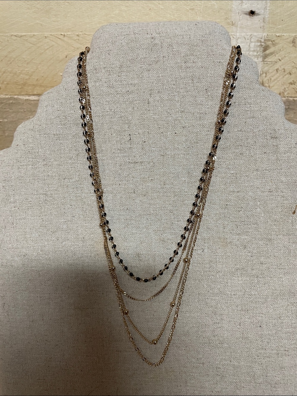 Four connected layering necklaces with lobster claw closure, 18” to 20” length